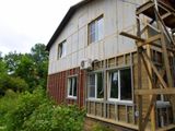 Отделка дома сайдингом и аквапанелями
